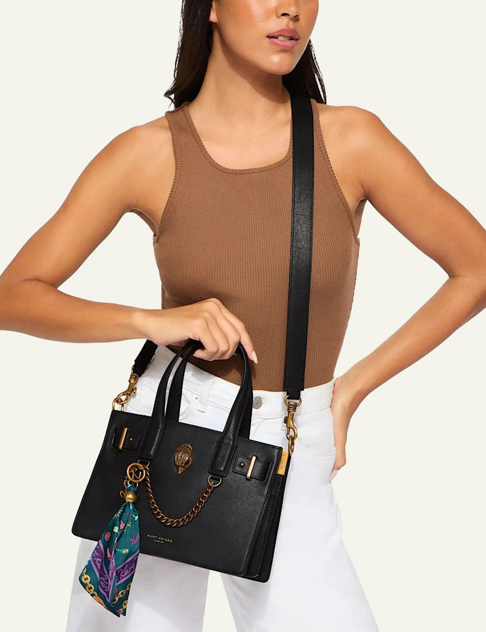 Black leather Kurt Geiger Sloane Small Tote bag with detachable shoulder strap, eagle head detail and decorative scarf model