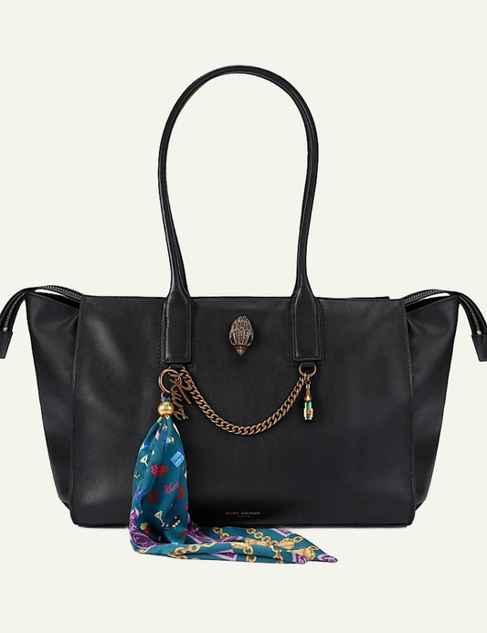 Black leather Kurt Geiger Sloane tote bag with eagle head detail, decorative chain and scarf charm