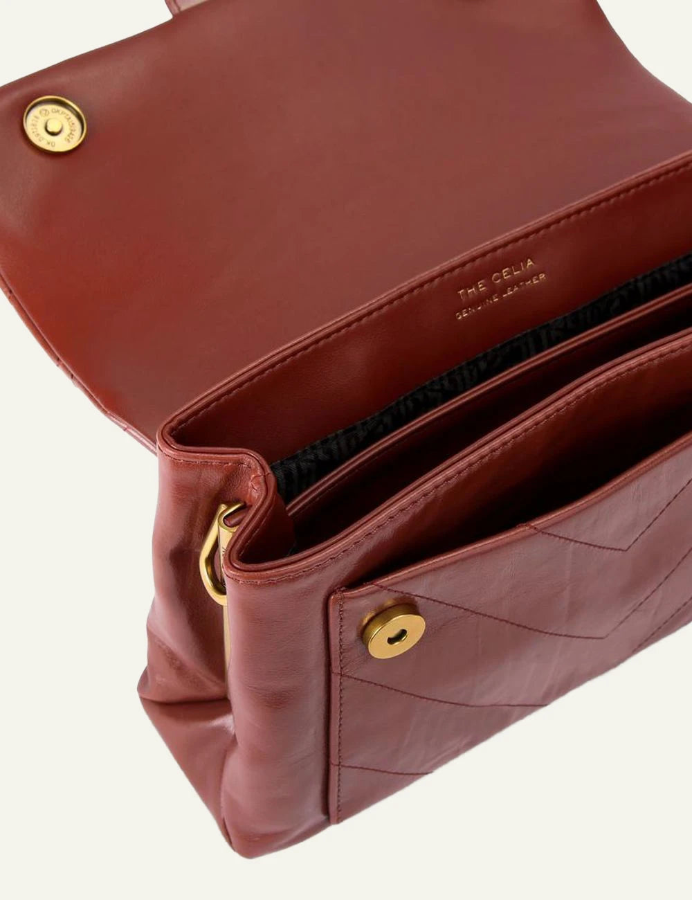 Wine leather Kurt Geiger shoulder bag with quilted finish, gold chain strap and eagle head clasp top