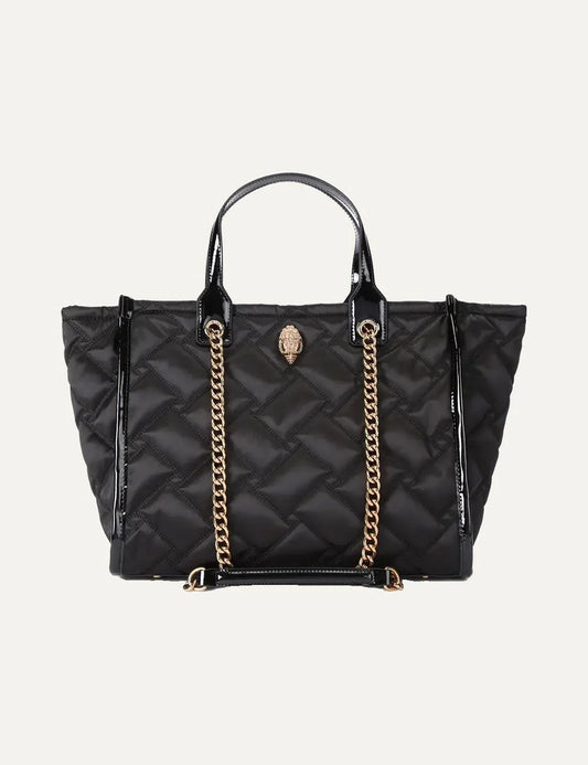 Kurt Geiger women's Hoxton Shopper black quilted nylon tote bag featuring diamond stitching, glossy black top handles, gold-tone chain shoulder strap, signature eagle head emblem and spacious shopper silhouette.
