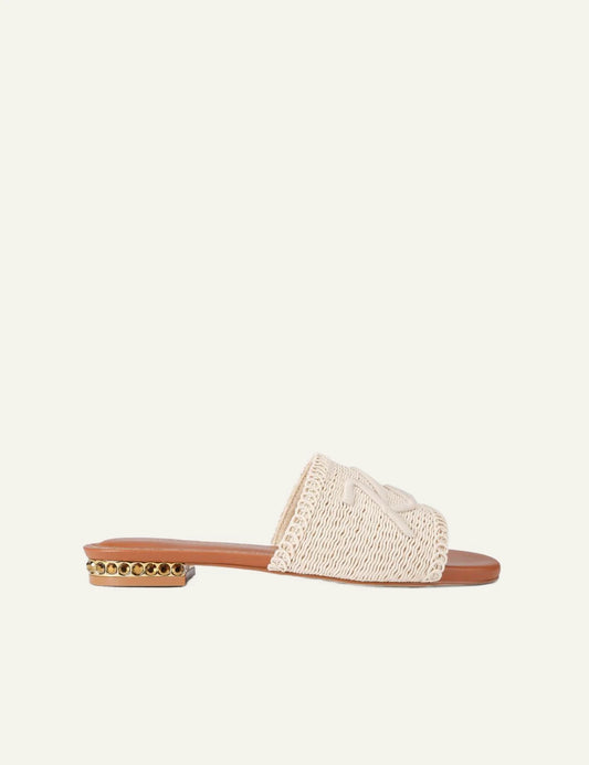 Kurt Geiger woven flat sandal beige fabric embroidered logo gold crystal heel side view