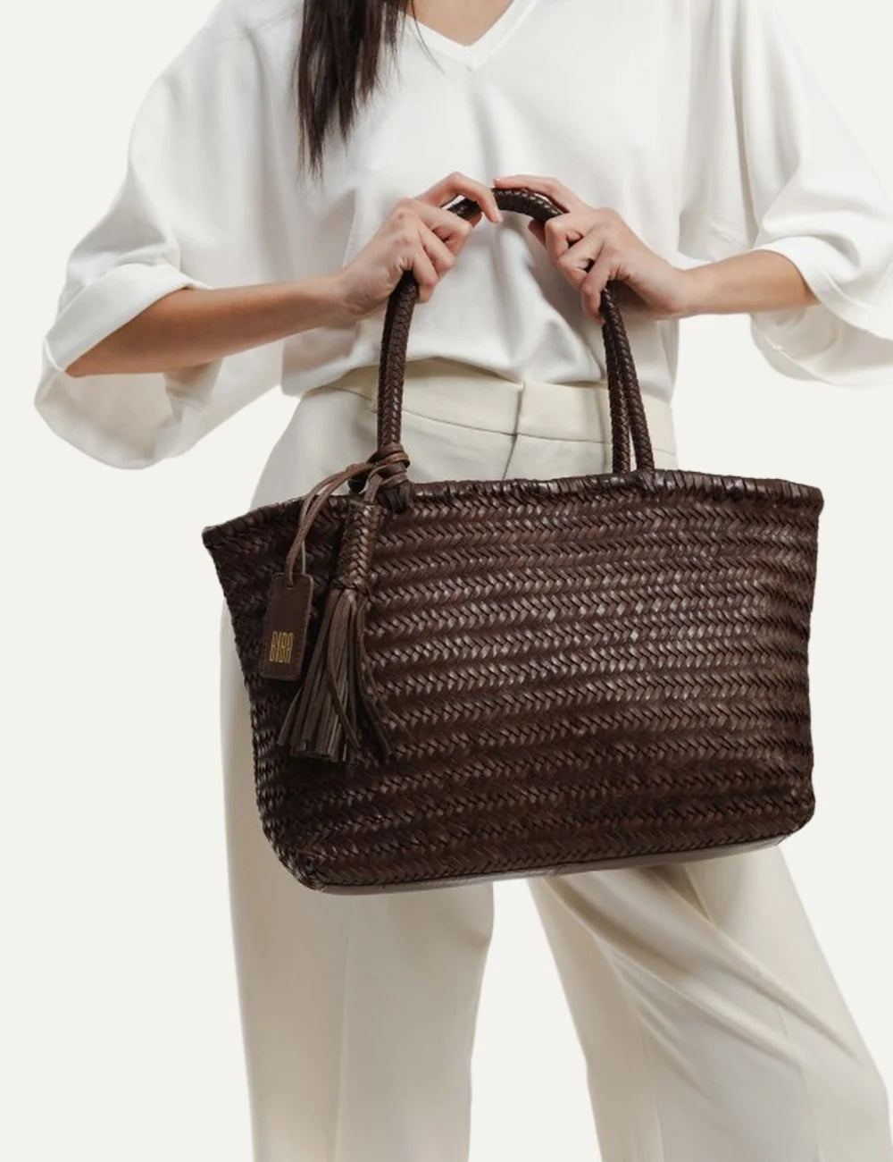 Biba Perkins dark brown woven leather shopper bag with herringbone pattern, braided handles and leather tassel model