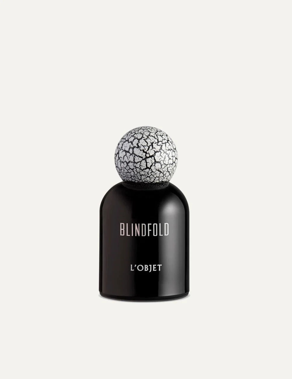 L'Objet Blindfold fragrance black bottle cracked cap front view