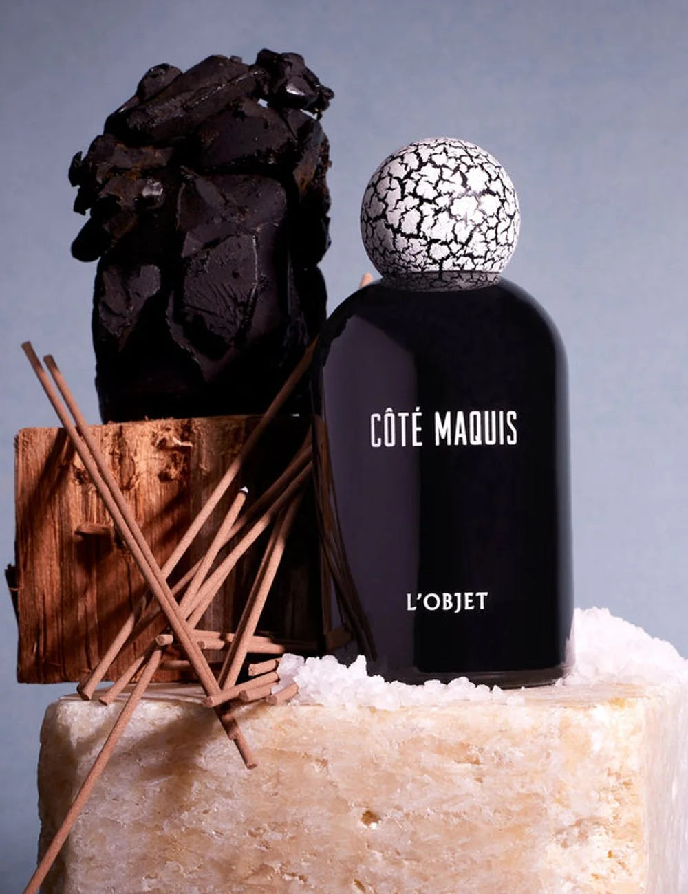 L'Objet Cote Maquis perfume black bottle cracked cap front detail view