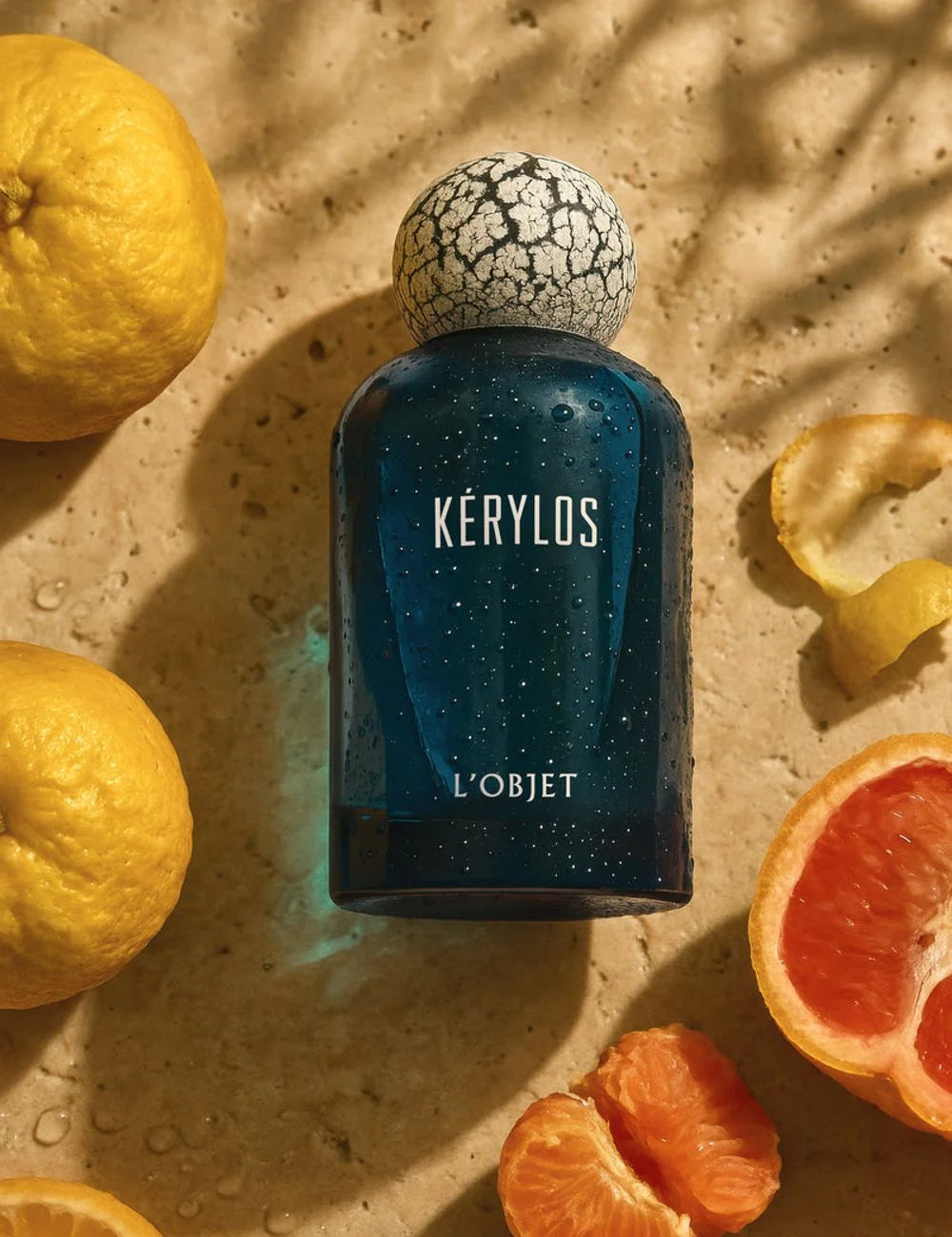 L'Objet Kerylos fragrance blue bottle cracked cap front detail view