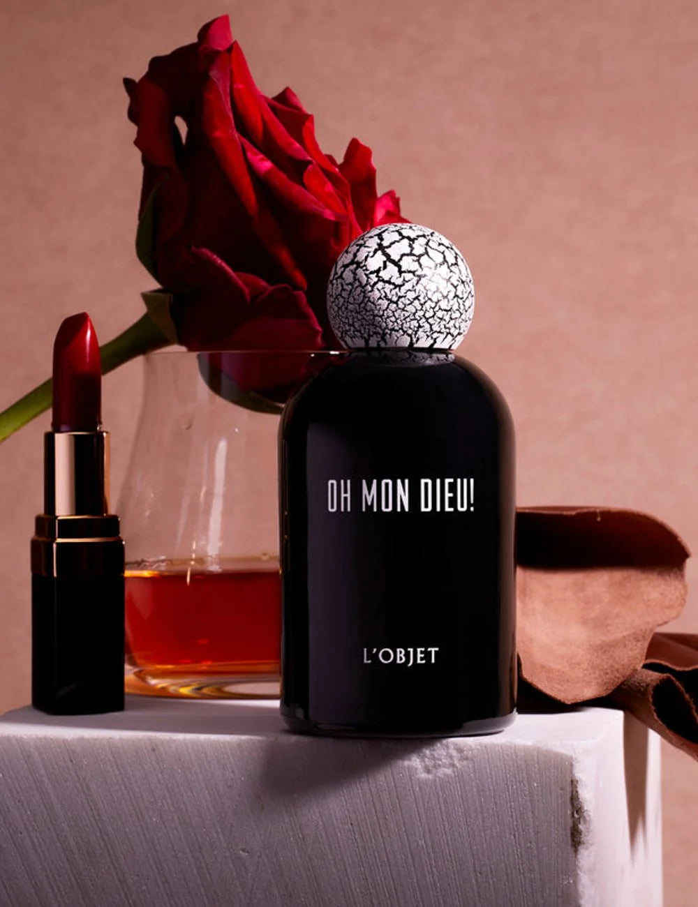 L'Objet Oh Mon Dieu fragrance black bottle cracked cap front detail view