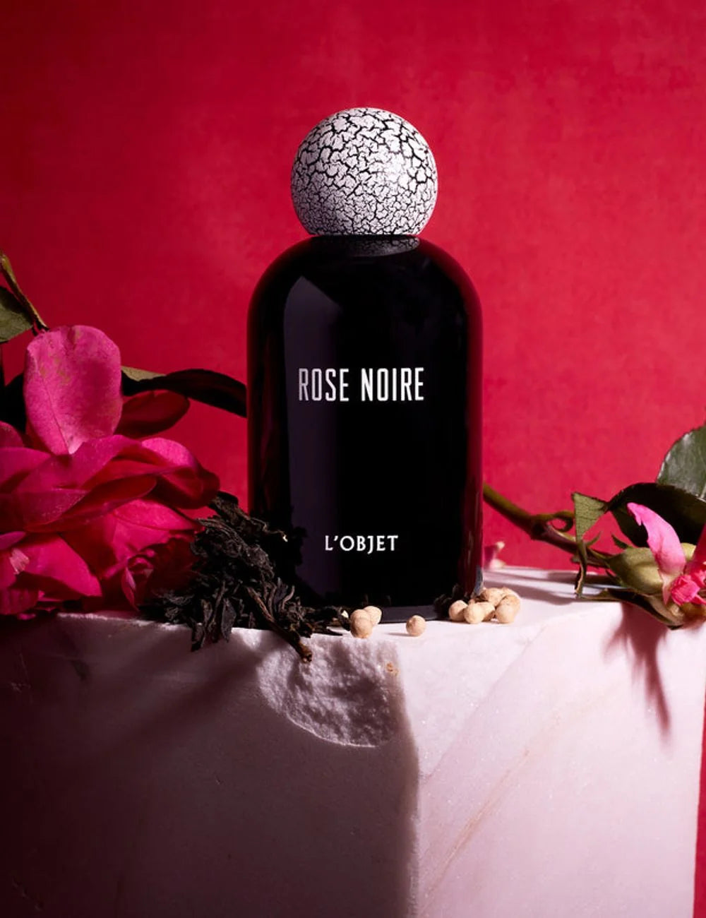 L'Objet Rose Noire perfume black bottle cracked cap front detail view