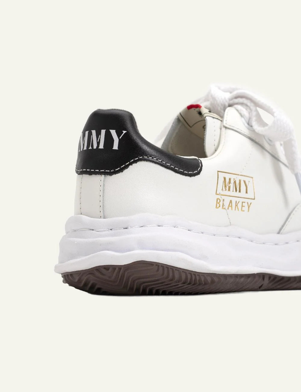 Maison Mihara Yasuhiro Blakey gold MMY logo leather detail