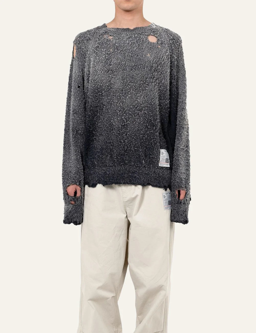 Maison Mihara Yasuhiro sun faded knit sweater front view distressed cotton