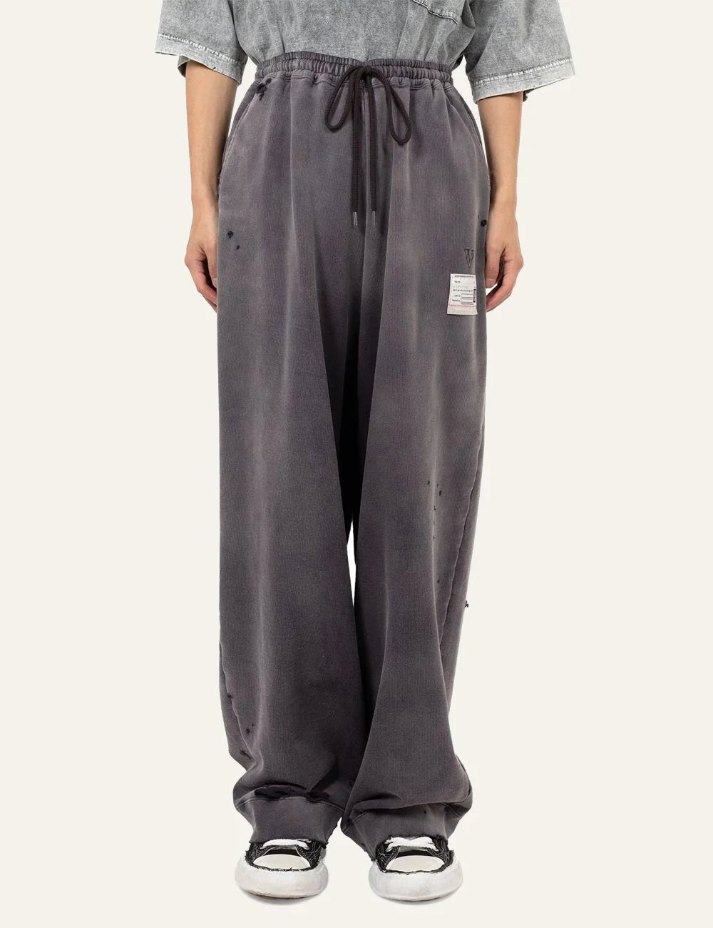 Maison Mihara Yasuhiro sun faded sweat pants front full view wide leg