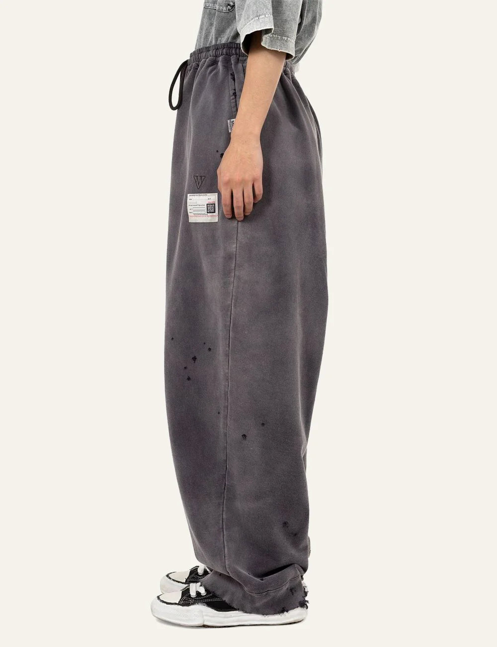 Maison Mihara Yasuhiro sun faded sweat pants side view distressed cotton