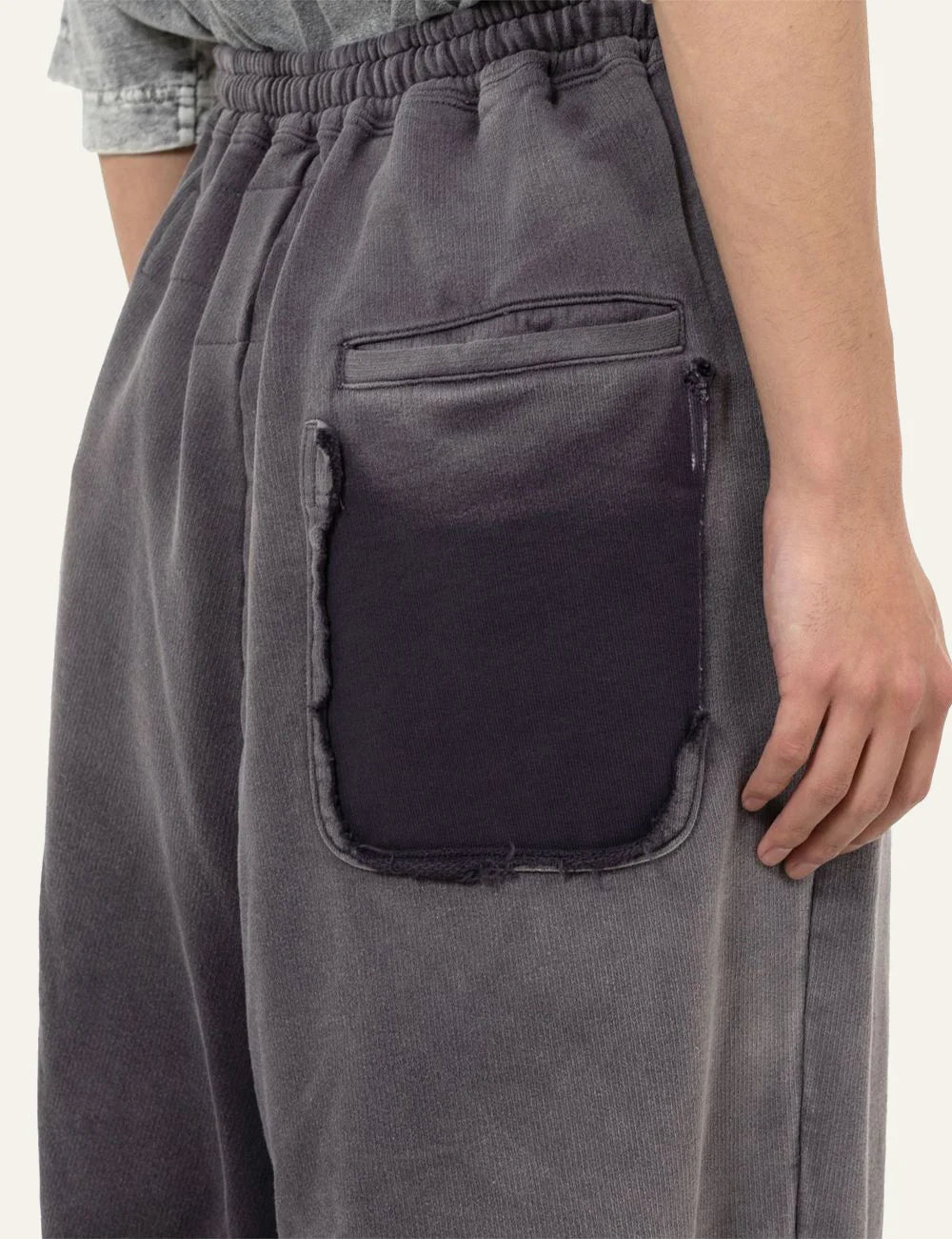 Maison Mihara Yasuhiro sweat pants back pocket distressed detail