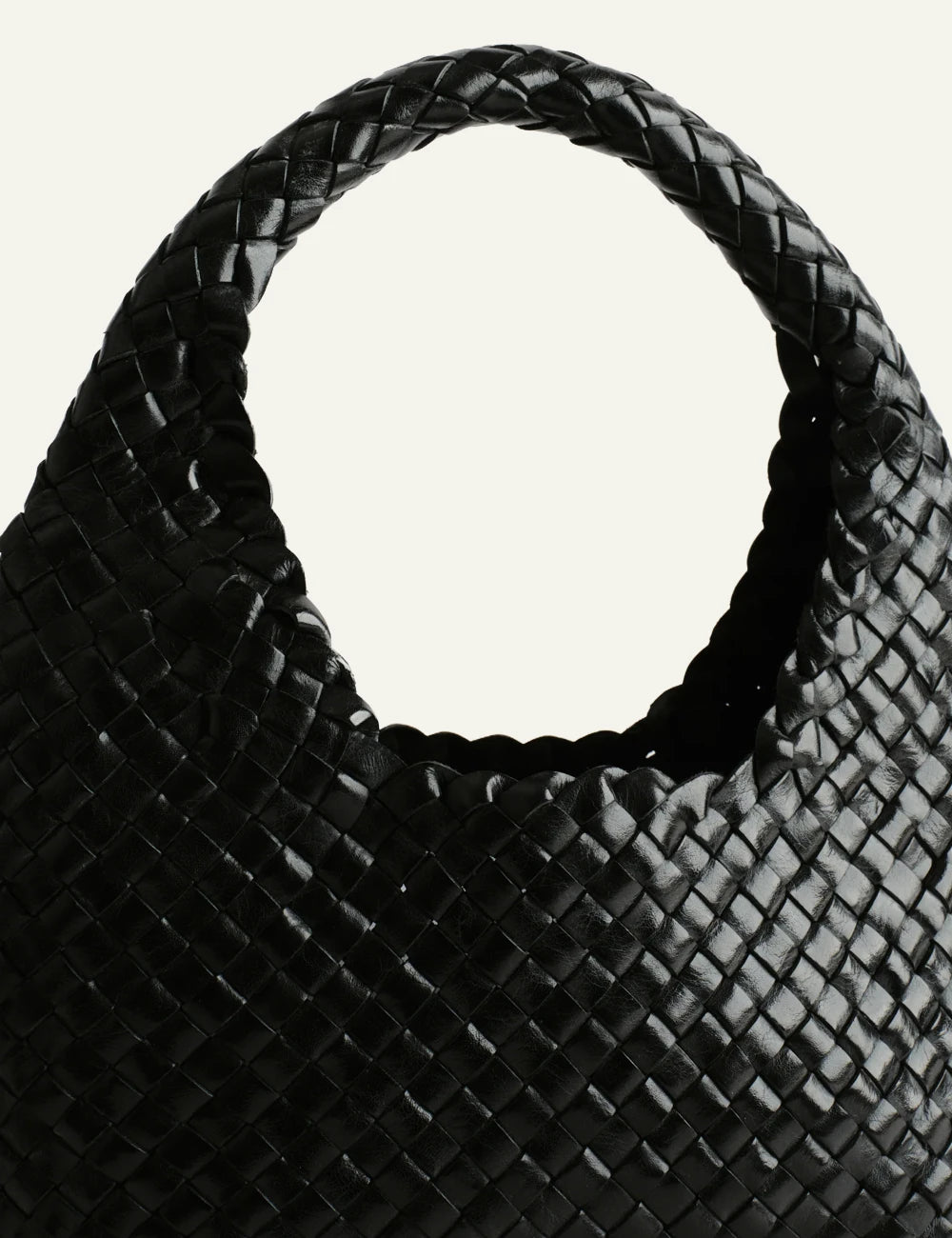 Manebi Halfmoon woven leather bag black front detail view