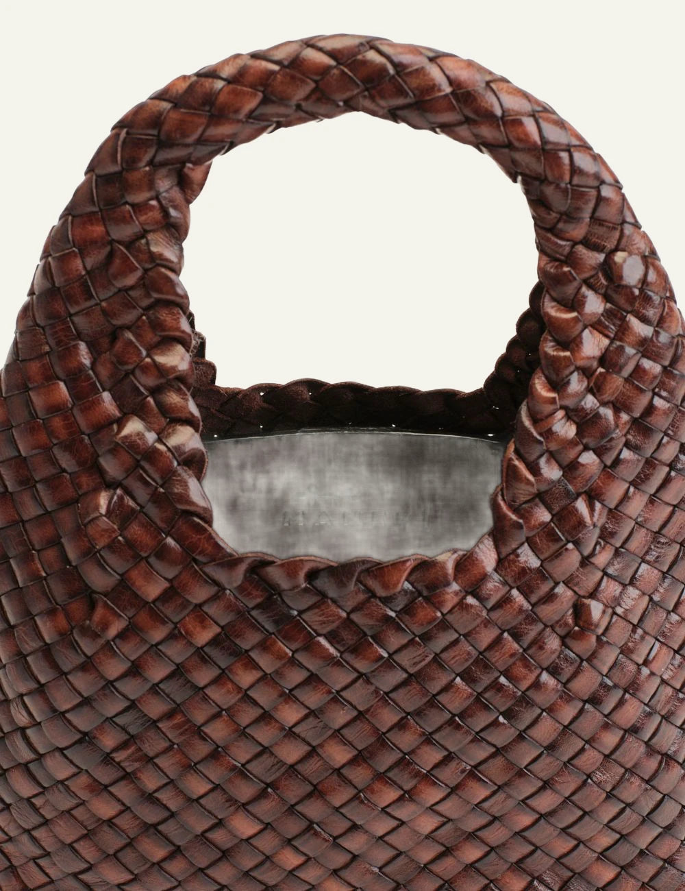 Manebi Halfmoon woven leather bag dark brown front detail view