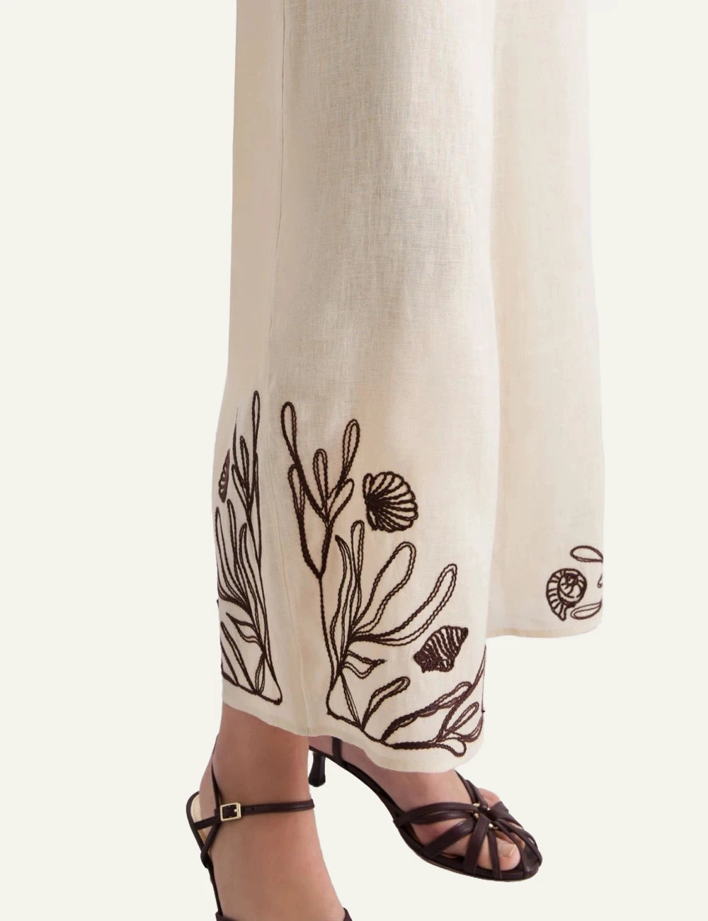 Marella linen wide leg trousers ecru embroidered hem side detail view