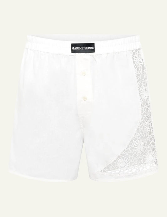 Marine Serre white lace patchwork shorts front view