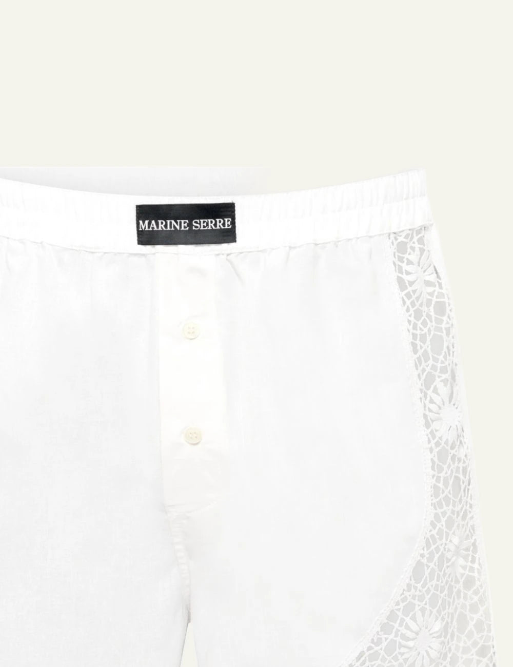 Marine Serre white lace patchwork shorts front detail view