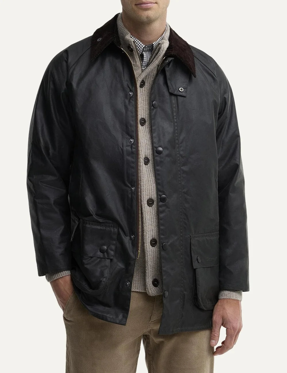 Men's Barbour Beaufort waxed cotton jacket with corduroy collar, Classic Barbour tartan lining, two-way zip and utility pockets front view