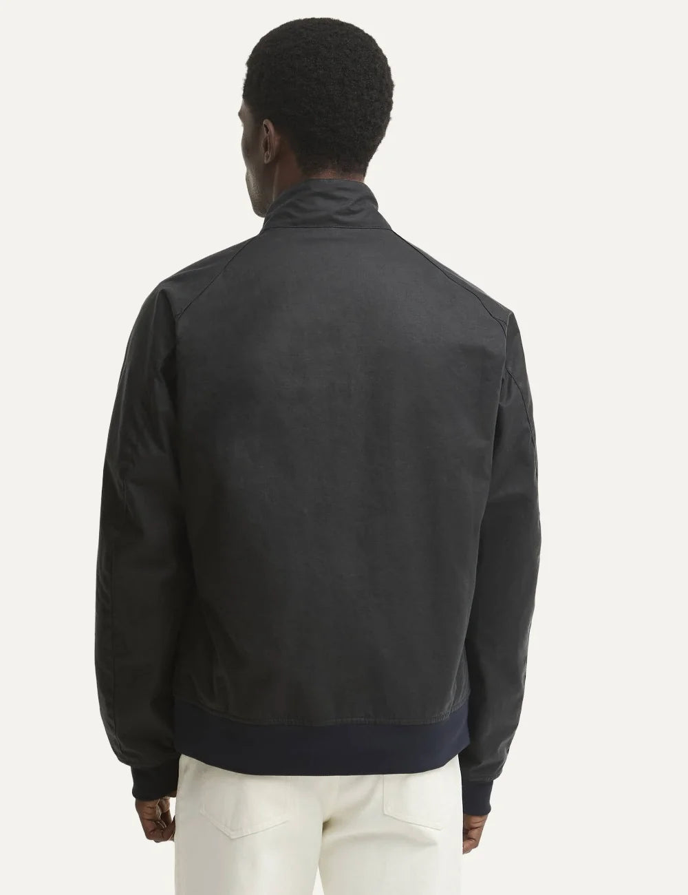 Men's Barbour Chelsea Blouson navy waxed cotton jacket with ribbed cuffs and hem, zip fastening and tartan lining back view