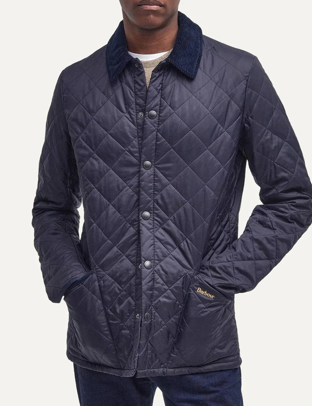 Men's Barbour Heritage Liddesdale navy diamond quilted jacket with corduroy collar, snap fastening and patch pockets front view