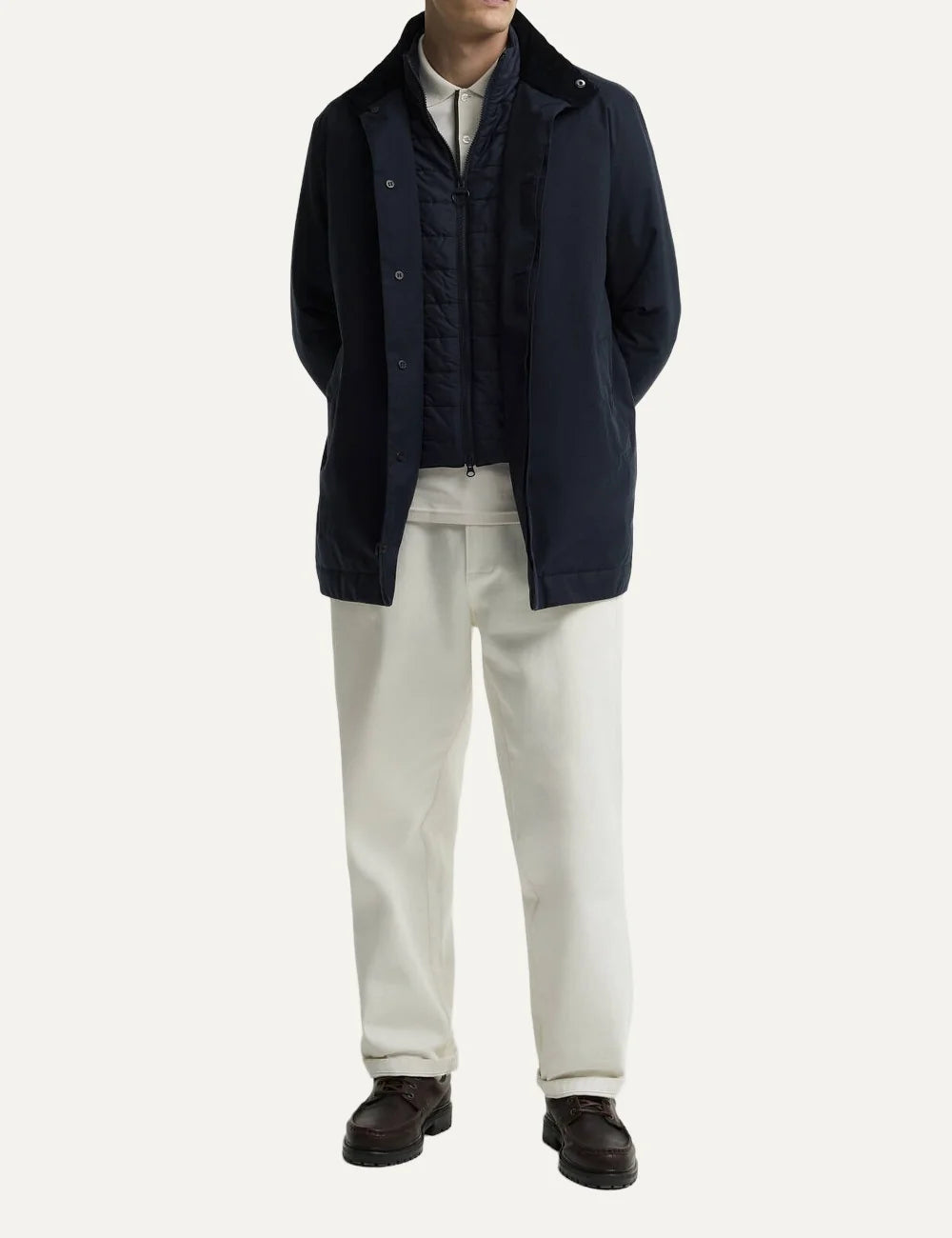 Men's Barbour Northdale navy waterproof mac coat with brushed herringbone finish, quilted wind guard and concealed button fastening full look