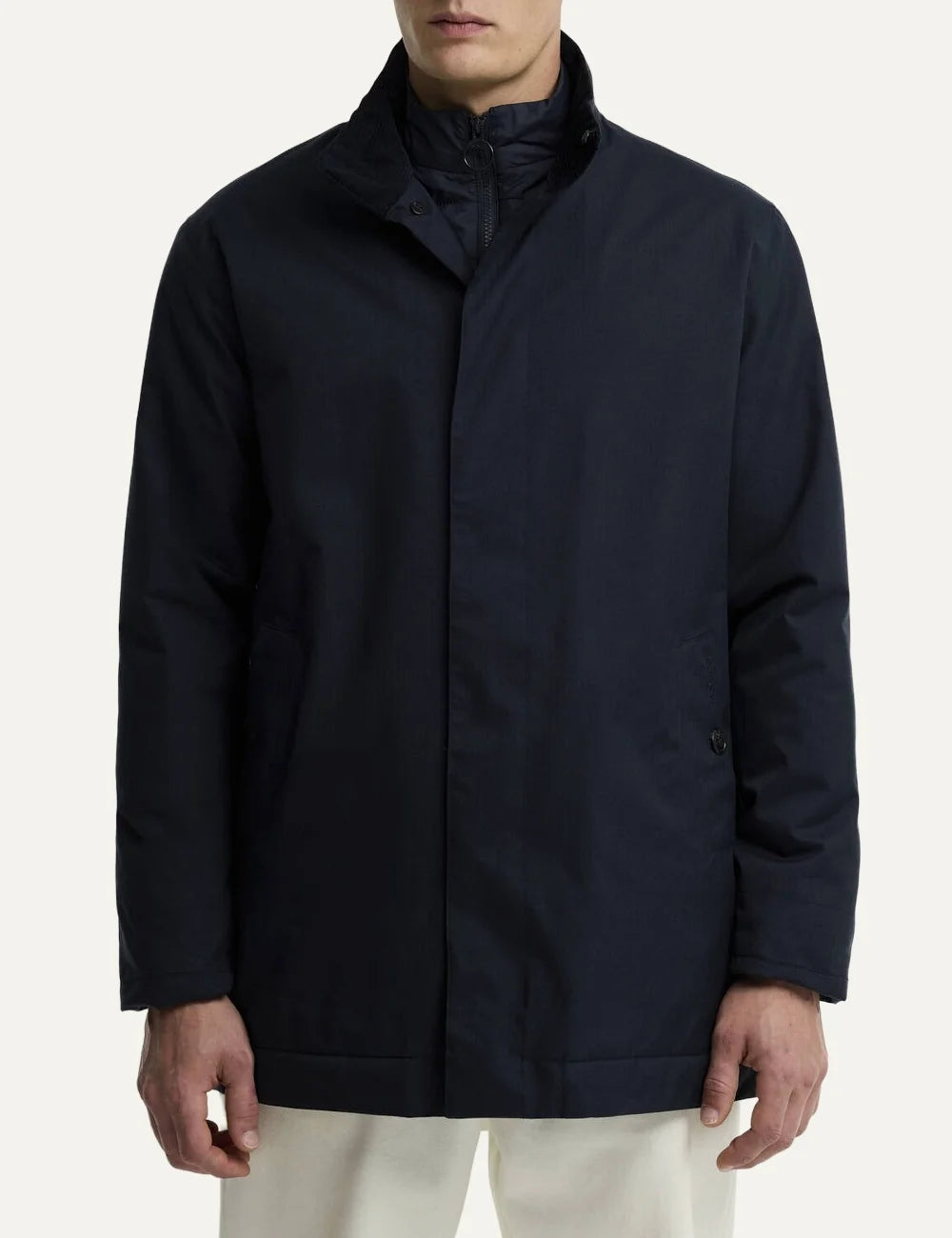 Men's Barbour Northdale navy waterproof mac coat with brushed herringbone finish, quilted wind guard and concealed button fastening front view