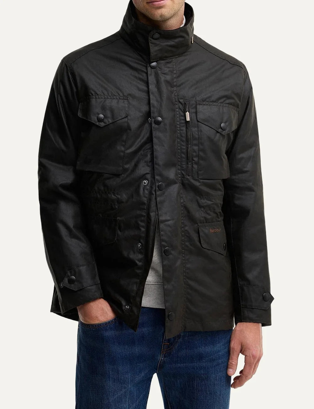 Men's Barbour Sapper dark olive Sylkoil waxed cotton jacket with four pockets, drawcord waist, quilted lining and stowaway waterproof hood front view