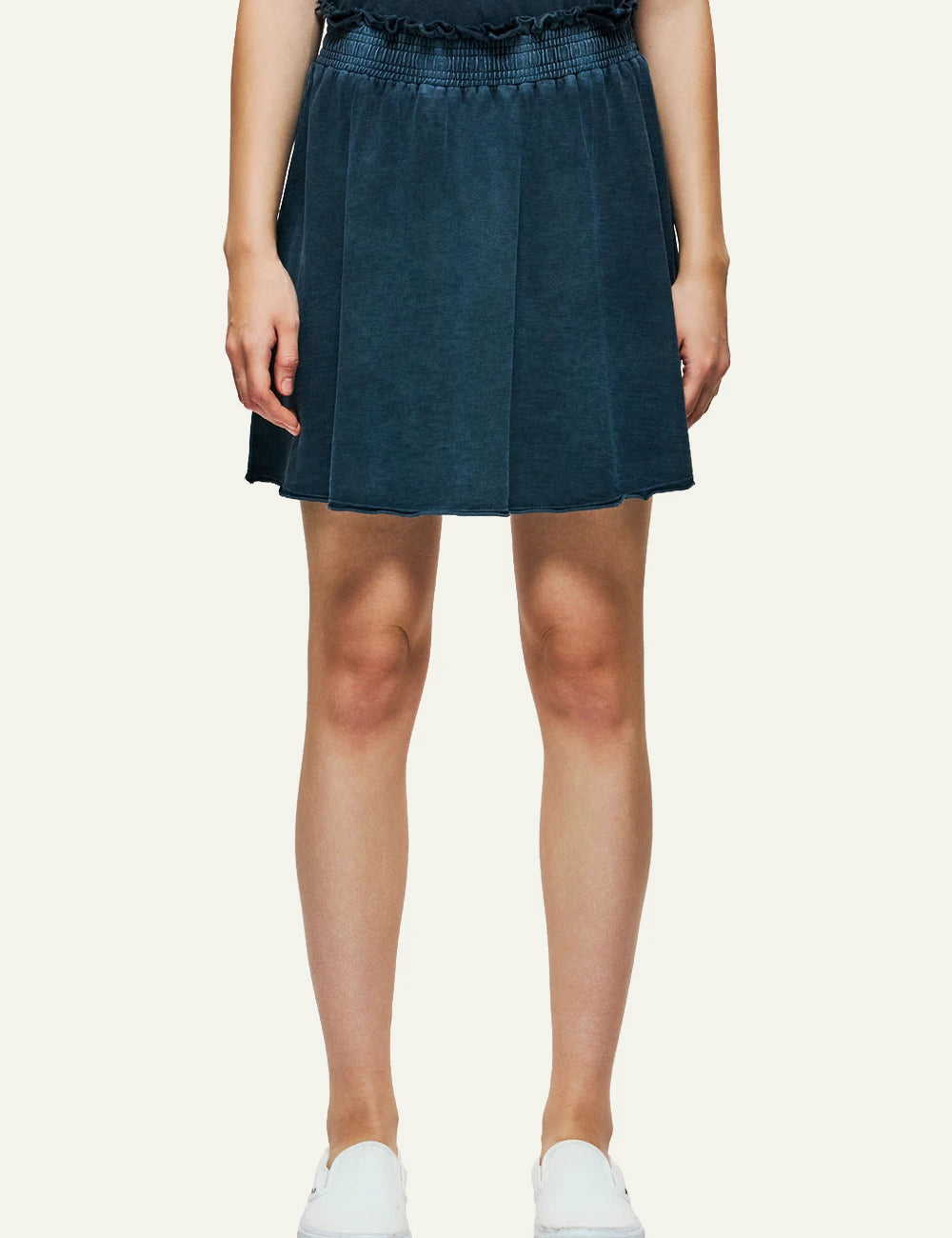 dark blue mini skirt raw edges elastic waist casual fit model view.
