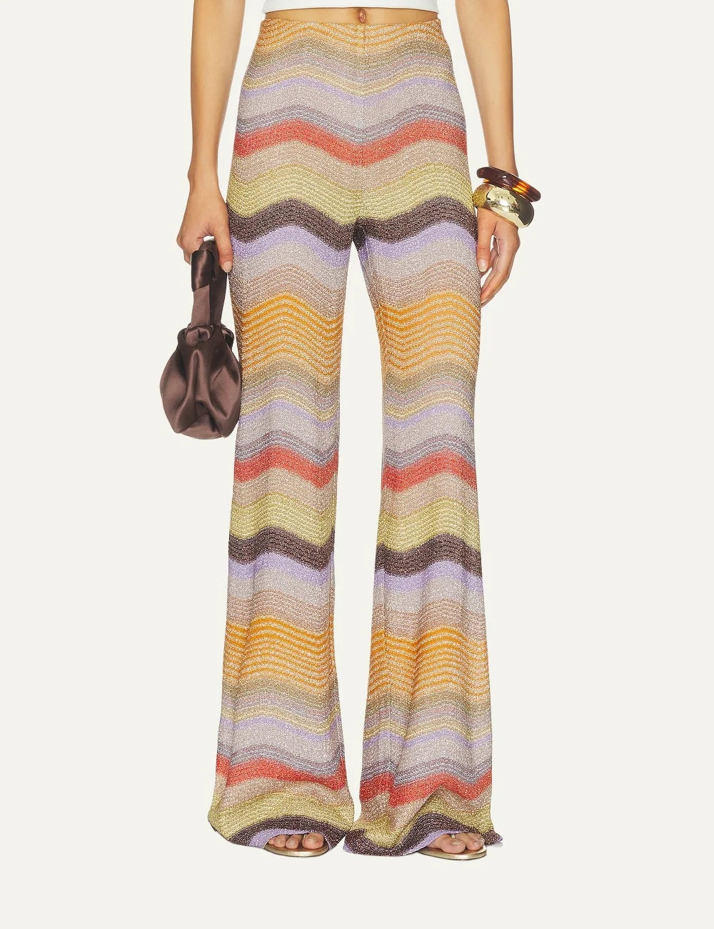 Missoni women's multicolor metallic zigzag knit wide leg trousers with elasticated waistband and shimmering orange, yellow, lilac and brown stripes.