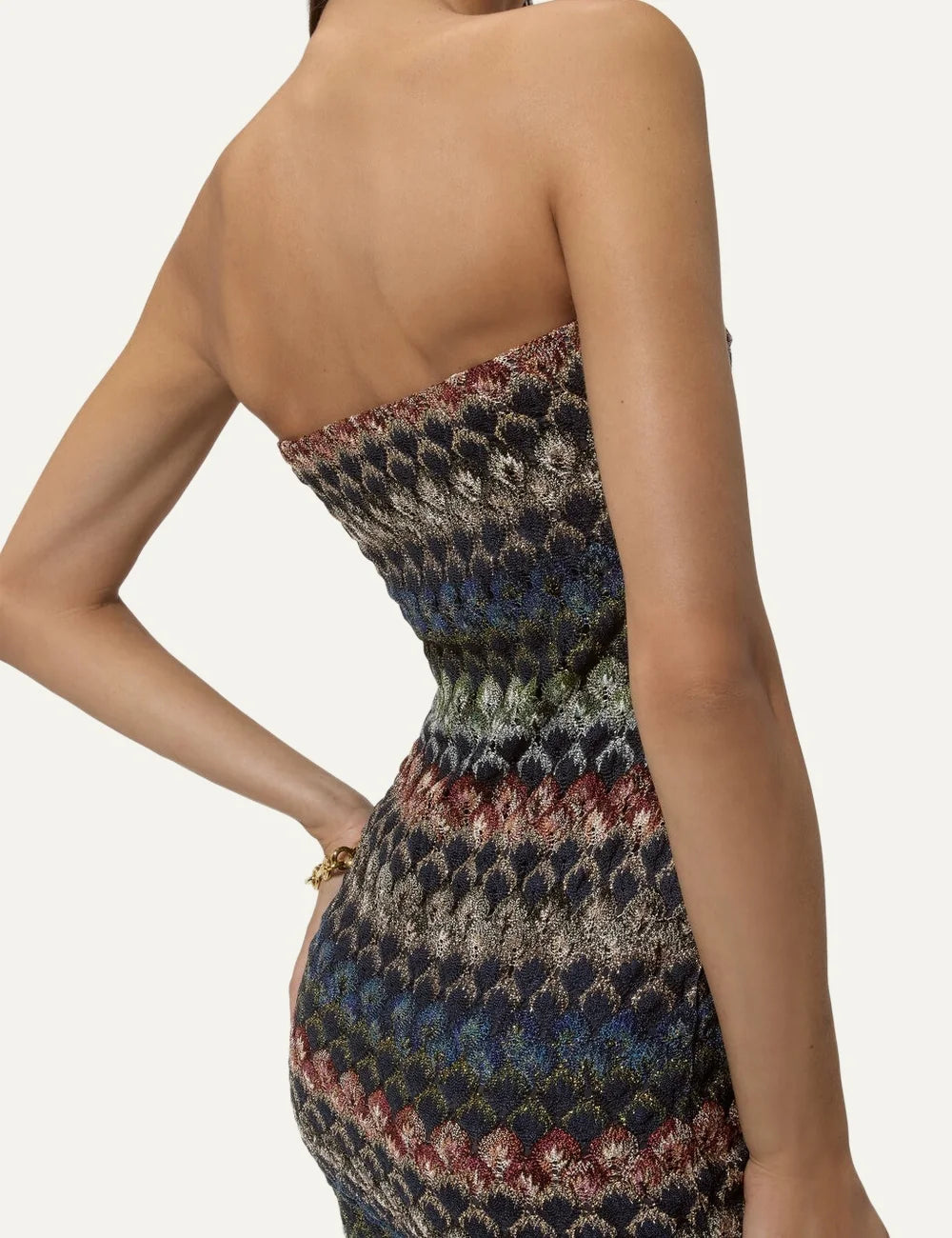 Missoni women's multicolor strapless mini dress with a structured bustier silhouette and intricate geometric lace knit pattern in blue, burgundy, green and beige tones back detail