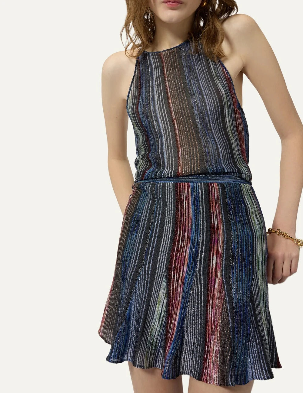 Missoni women's multicolor lamé knit mini skirt with vertical space-dye stripes, fitted waist and flared ruffled hem model