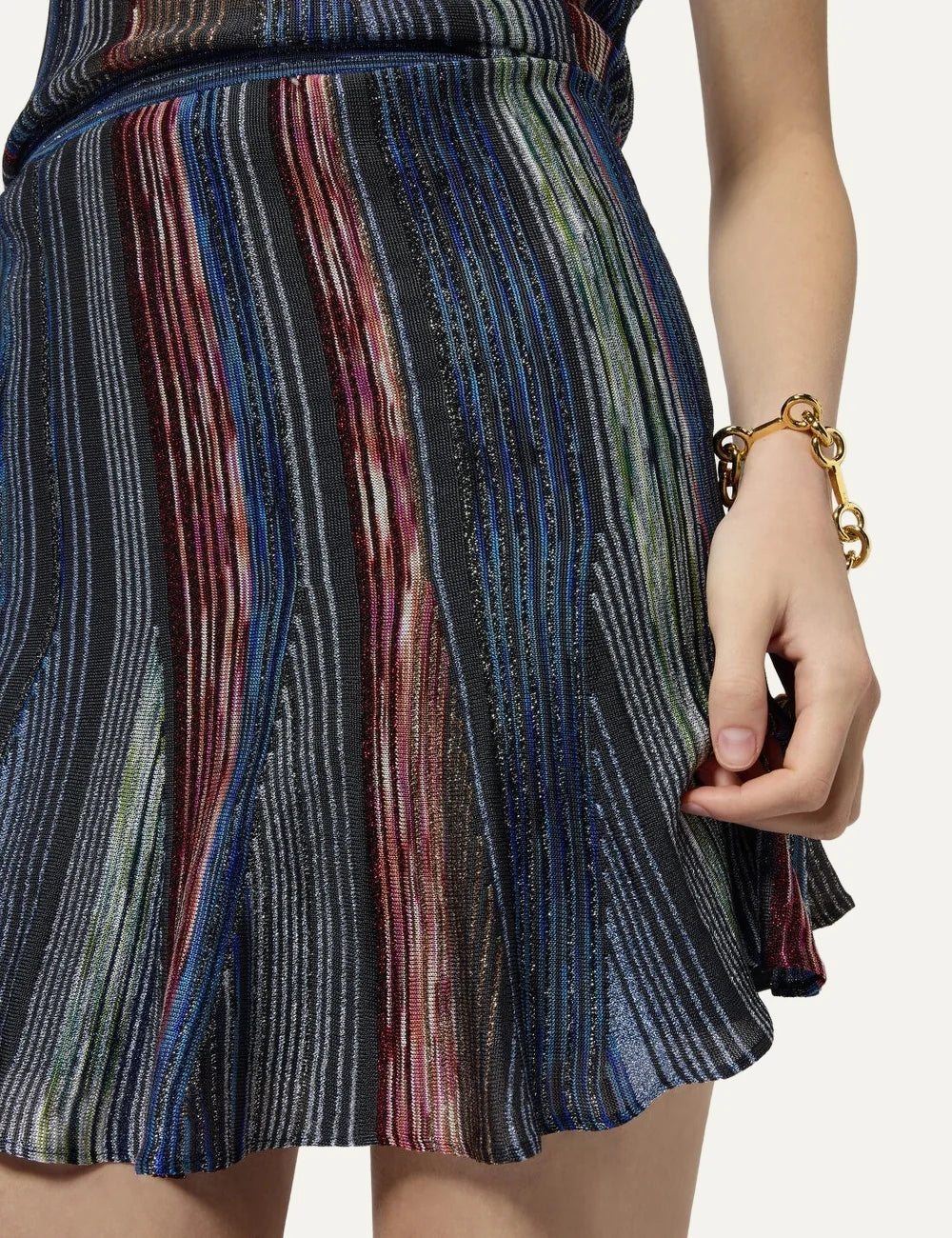 Missoni women's multicolor lamé knit mini skirt with vertical space-dye stripes, fitted waist and flared ruffled hem detail