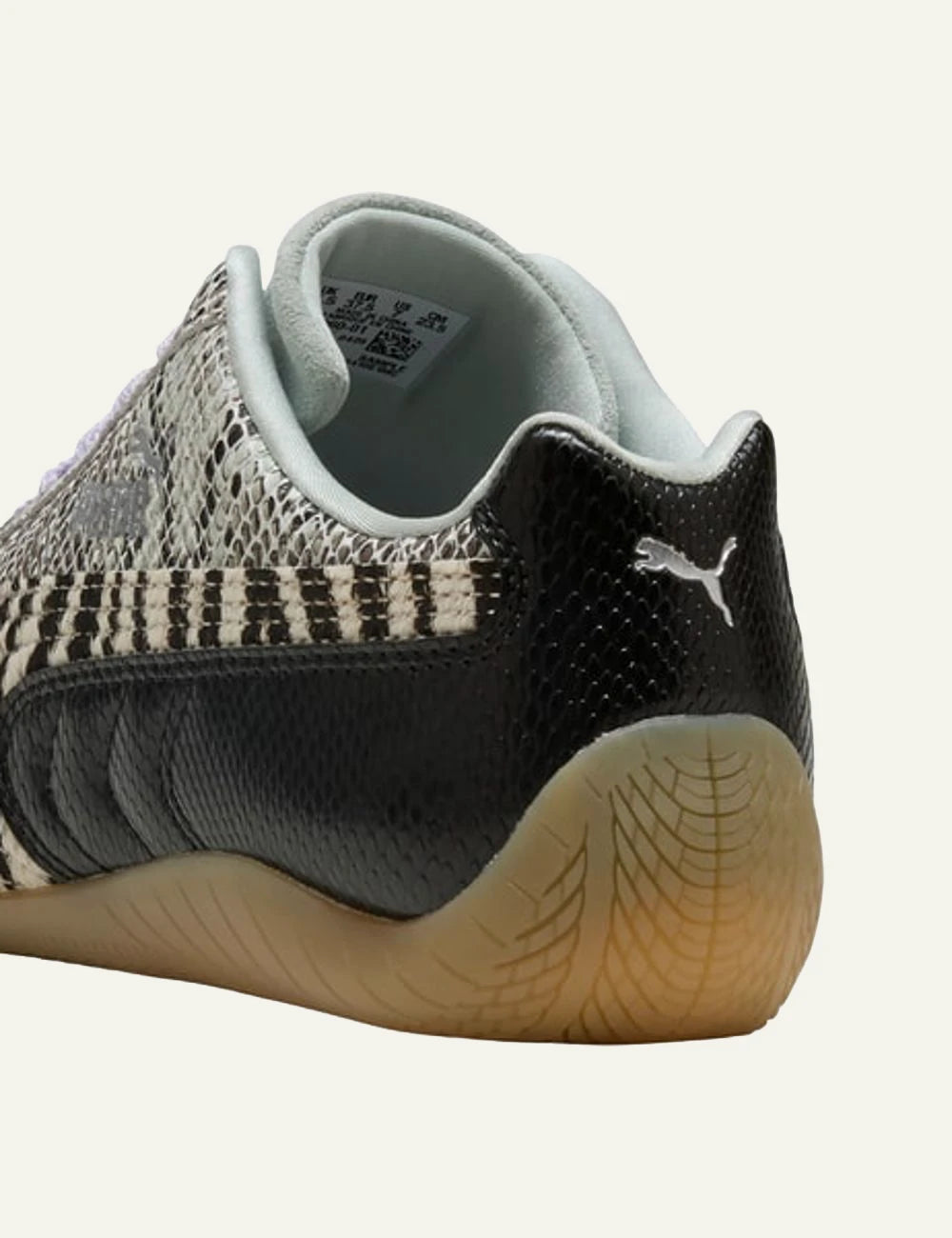 Mixed animal print sneakers with zebra and snake pattern back view 
