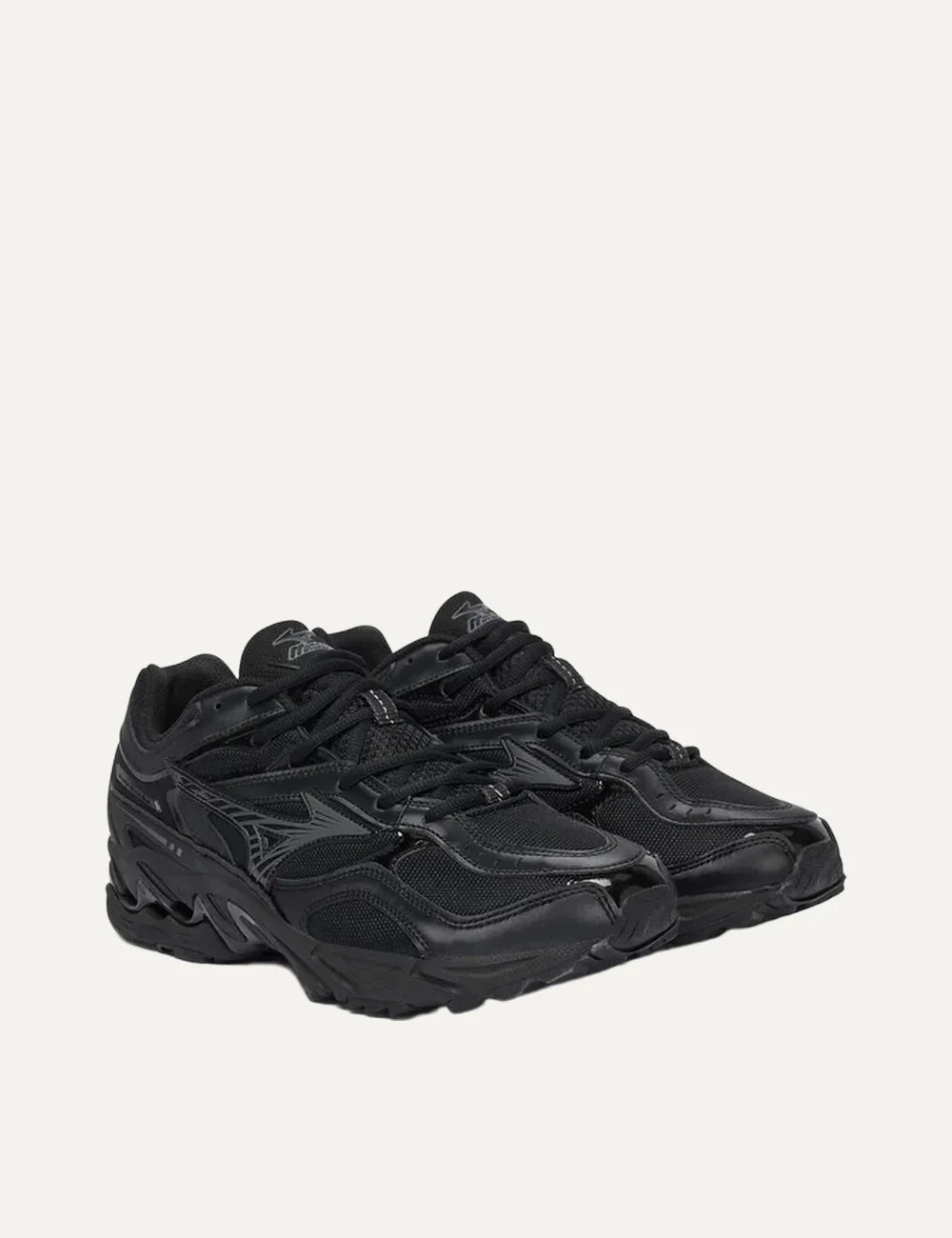 Mizuno Wave Mustang LS Tech black sneakers with mesh panels, metallic grey overlays, lace-up fastening and sculpted chunky sole angled
