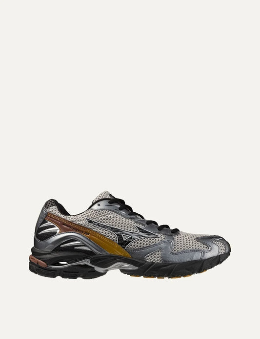 Mizuno Wave Rider 10 Sport grey mesh sneakers with metallic silver overlays, black laces, mustard yellow accents and chunky black sole.