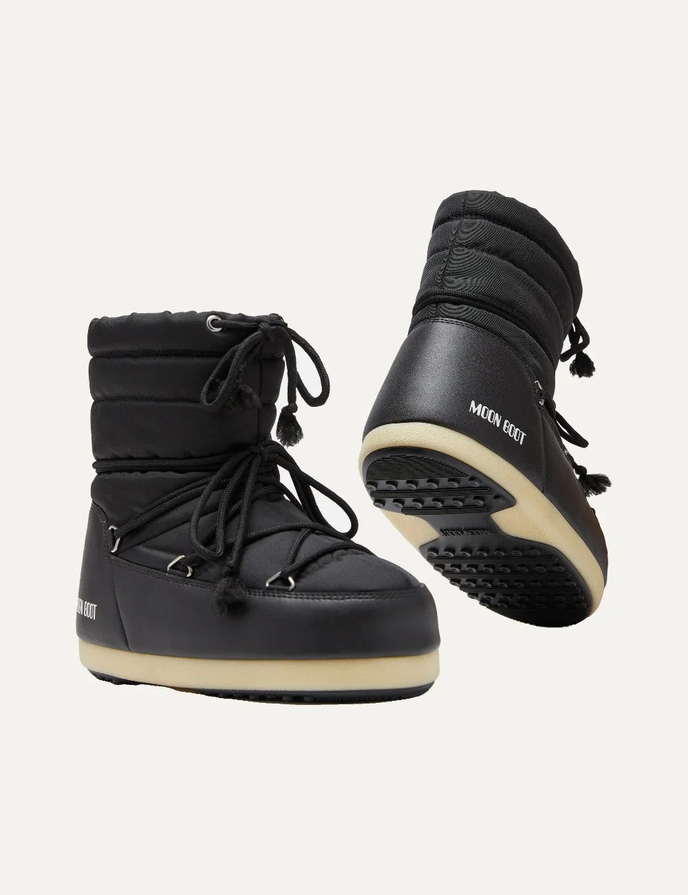 Moon Boot women EVX Light Low black nylon quilted boots with criss-cross laces and drawstring sole view