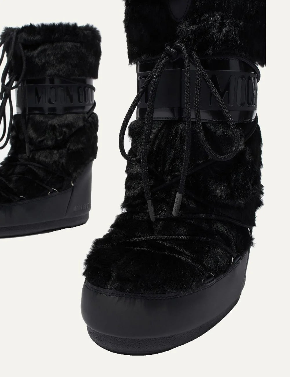 Moon Boot women Icon black faux fur boots with criss-cross laces and logo details , pair front view 