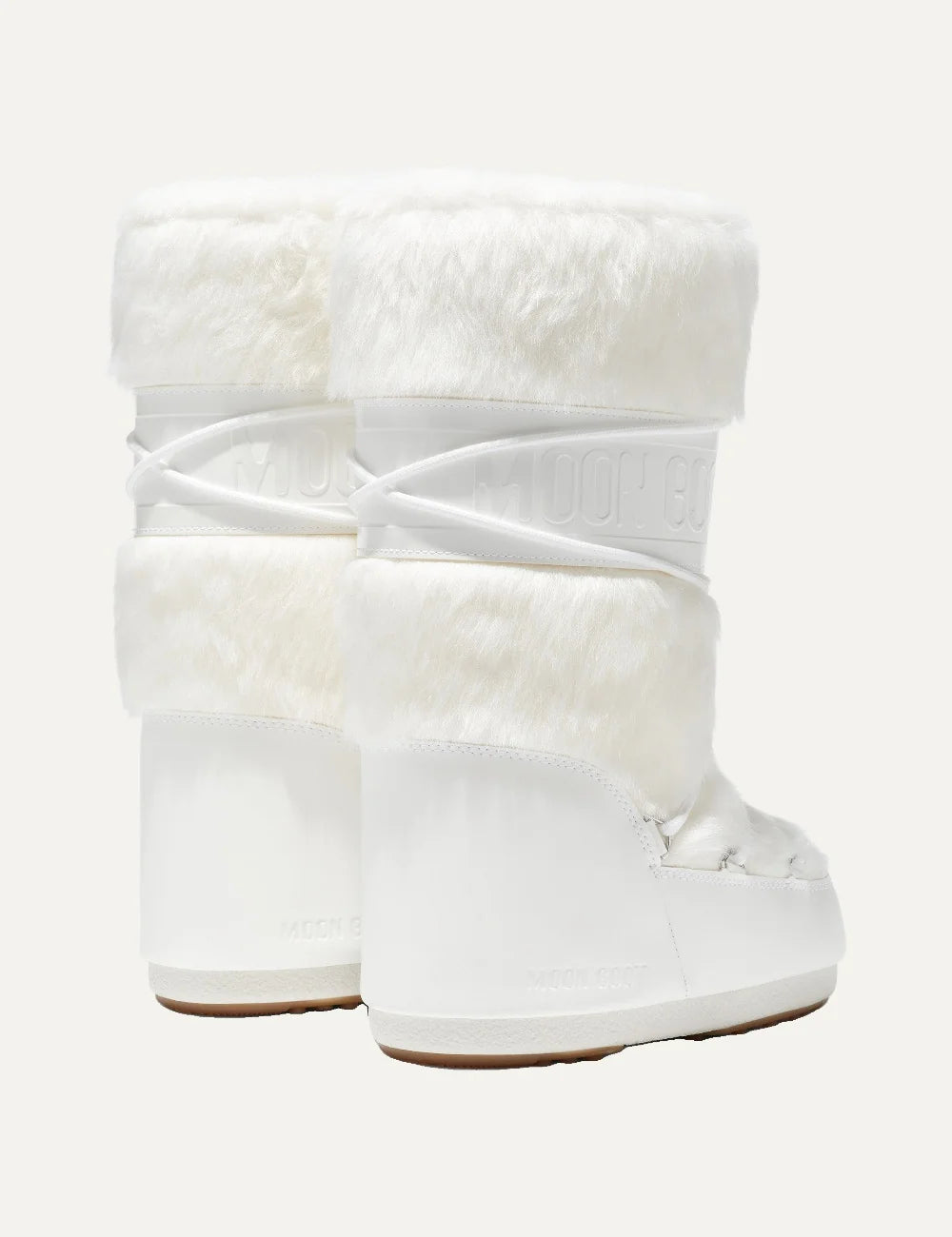 Moon Boot women Icon white faux fur boots with criss-cross laces and logo details back view
