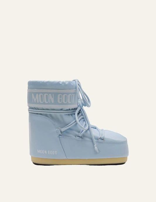 Moon Boot women Icon Low sky blue nylon boots with criss-cross laces and logo details side view
