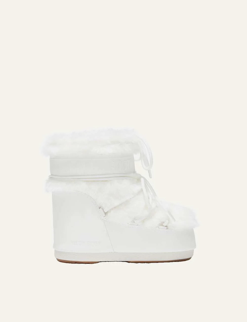 Moon Boot women Icon Low white faux fur boots with criss-cross laces and logo details side view