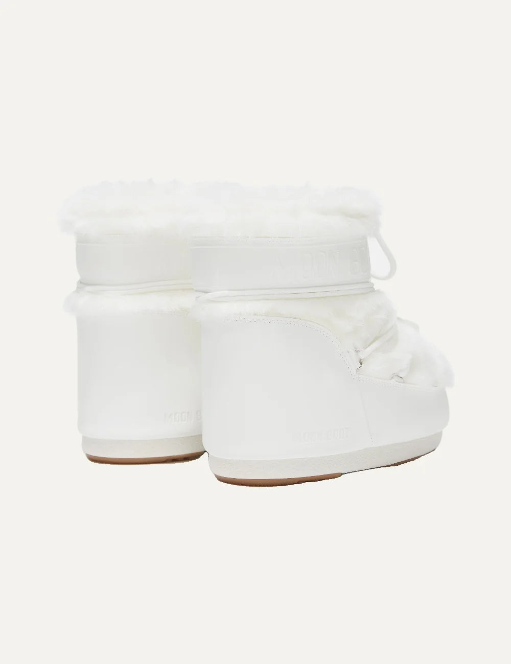 Moon Boot women Icon Low white faux fur boots with criss-cross laces and logo details back view
