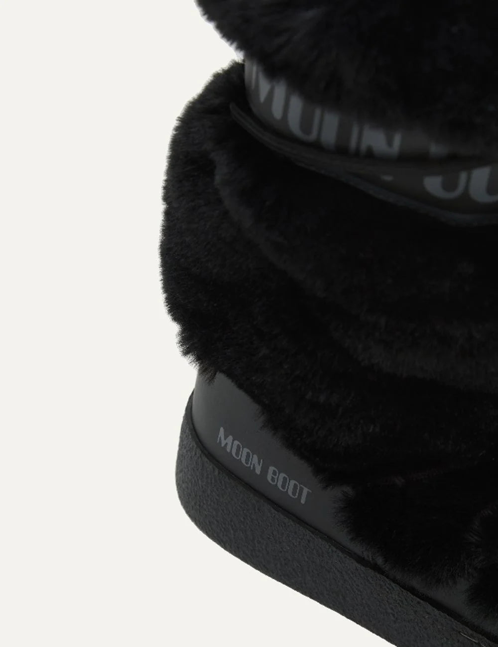 Moon Boot women Ltrack black faux fur high boots with drawstring, logo panel and rubber sole logo detail