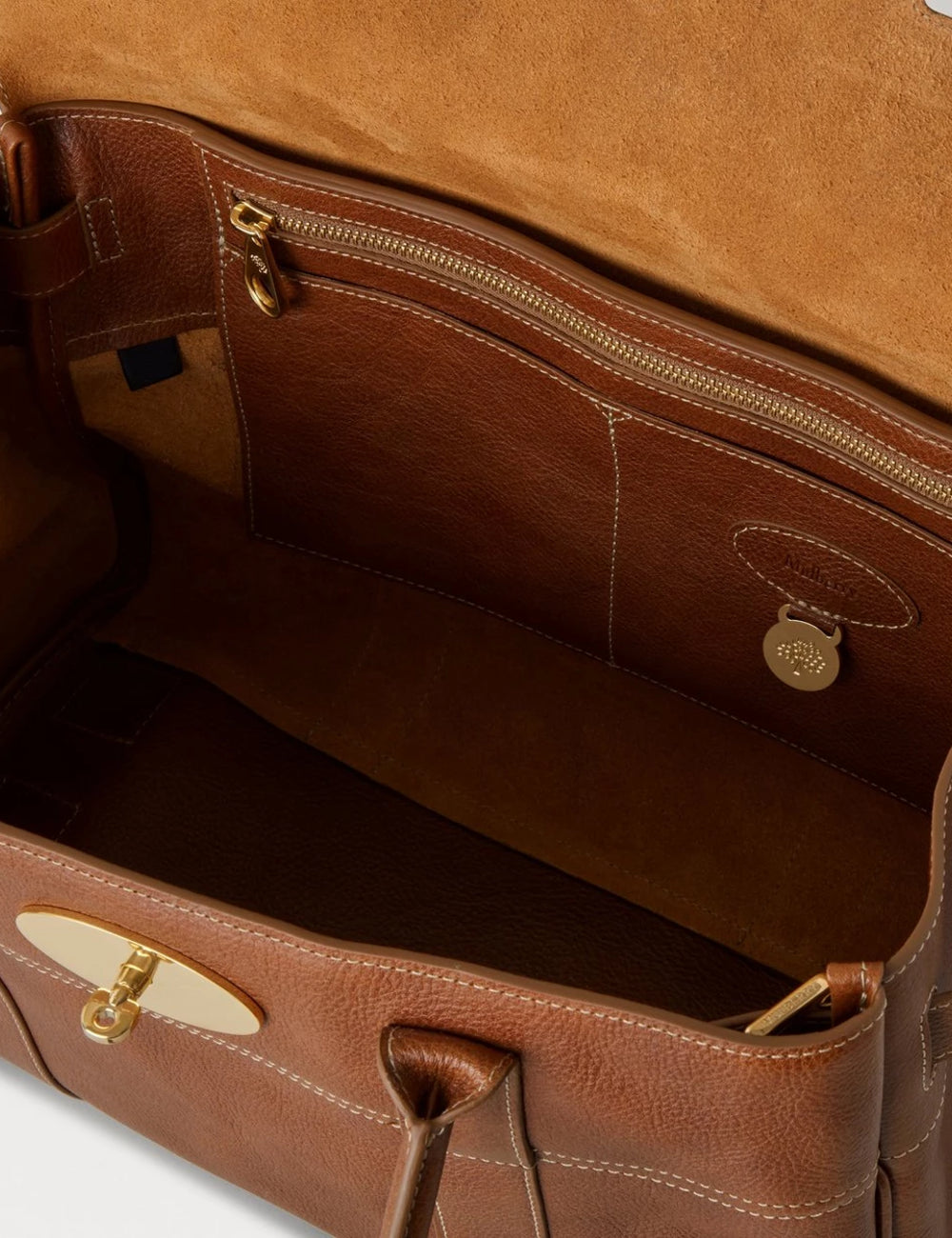 mulberry leather top handle bag signature padlock brass top view