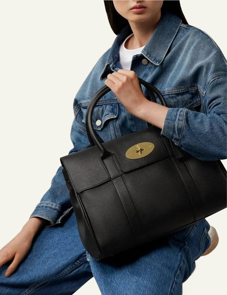 mulberry leather top handle bag brass hardware front model view