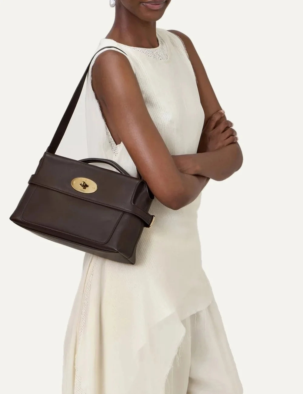 Mulberry women's dark brown top handle bag with structured silhouette, detachable shoulder strap, flap front pocket and gold-tone Postman's Lock model