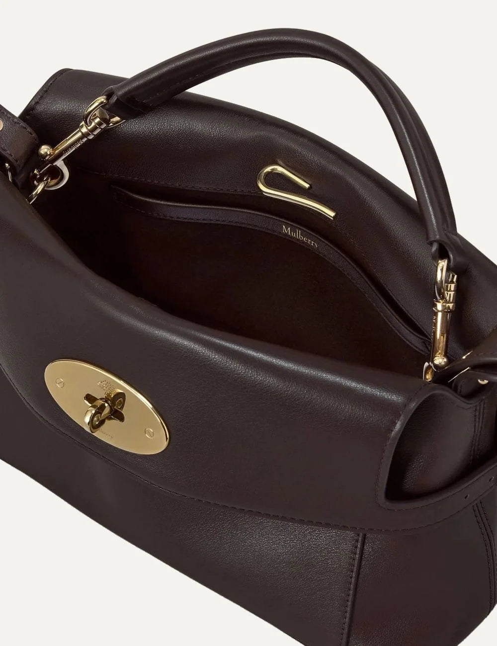 Mulberry women's dark brown top handle bag with structured silhouette, detachable shoulder strap, flap front pocket and gold-tone Postman's Lock top