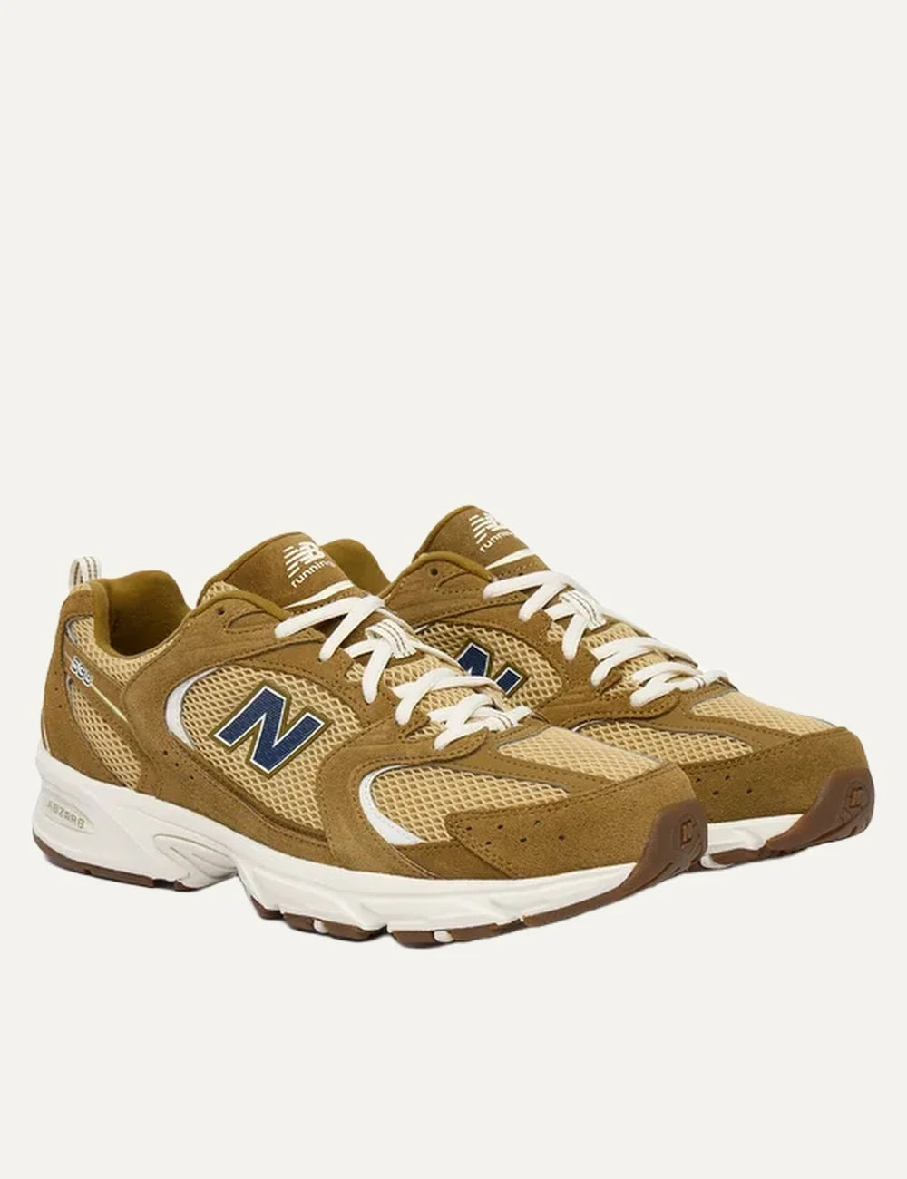 New Balance men's brown leather and mesh sneakers with ABZORB cushioning profile