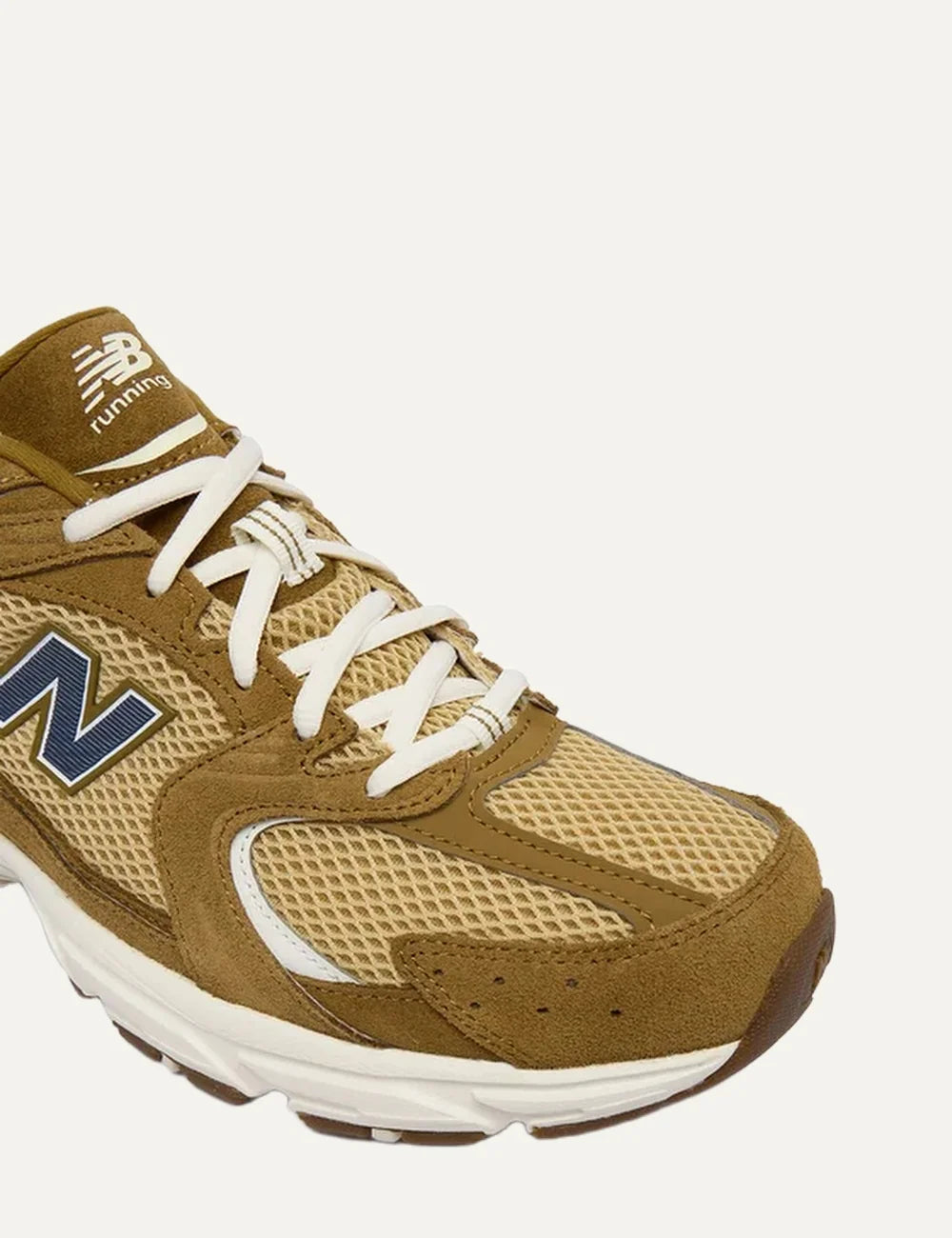 New Balance men's brown leather and mesh sneakers with ABZORB cushioning angled
