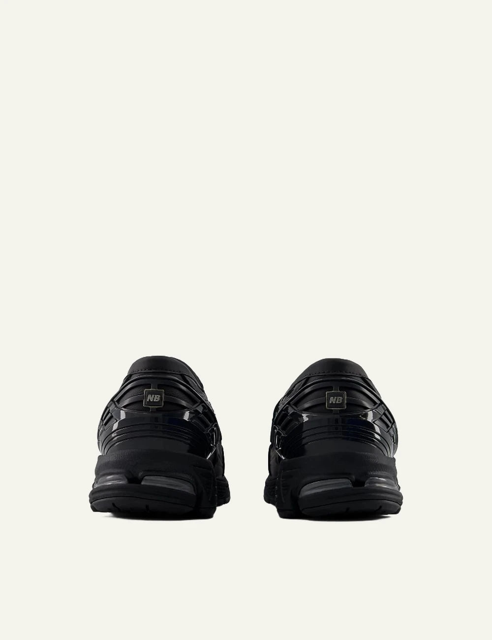 New Balance 1906 loafer sneaker black white back view