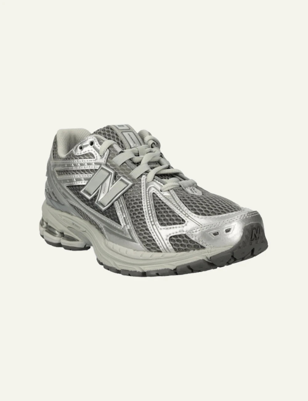 New Balance 1906R silver mesh sneakers angled view